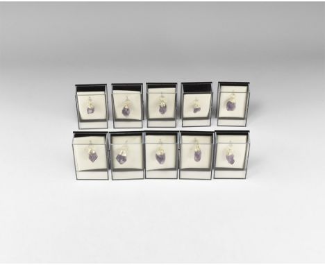 A group of ten amethyst points with electroform mounts and suspension rings; each in a perspex display box. 156 grams total, 