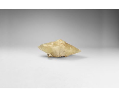 A large scalenohedral crystal of dark yellow calcite. 972 grams, 19cm (7 1/2"). From the historic ‘Victorian Museum’ and late