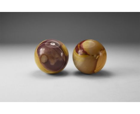 A pair of brown, purple and cream coloured jasper spheres. 350 grams total, 50mm (2"). From the historic ‘Victorian Museum’ a