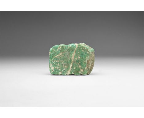 A fine specimen of green and white amazonite, in white card tray with label reading: 'AMAZONITE, Russia'. 62 grams, 47mm (1 3