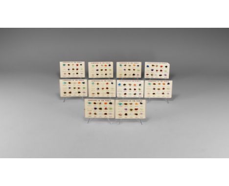A set of ten paper cards, each with identical samples of minerals including turqurenite, tiger's eye, agate, sodalite, unakit