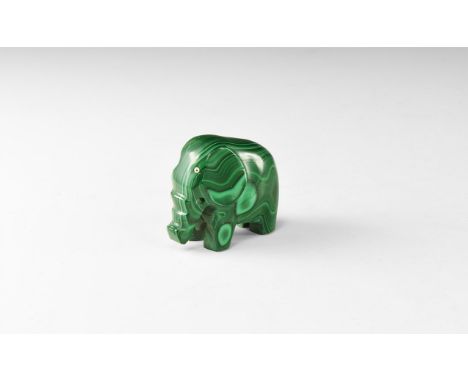 A statuette of an elephant carved from a banded dark green malachite. 141 grams, 53mm (2"). From the historic ‘Victorian Muse