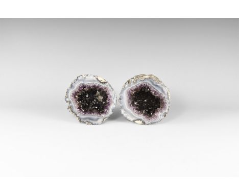 A pair of cut and polished geode with bands of blue agate and purple amethyst crystals to the centre. 1.26 kg total, 10.7cm (