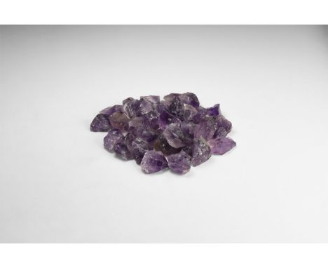 A group of thirty-nine purple amethyst crystals. 349 grams total, 18-37mm (3/4 - 1 1/2"). From the historic ‘Victorian Museum