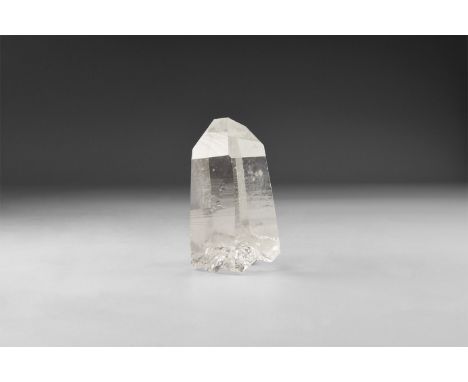 A fine specimen of transparent quartz crystal in white card box, with label reading: 'QUARTZ CRYSTAL, Hot Springs, Arkansas, 