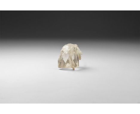 A translucent topaz crystal with well formed facets, in white card tray with Gregory, Bottley and Lloyd label reading: 'TOPAZ