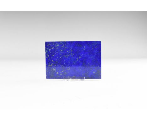 A high quality rectangular polished slice of lapis lazuli. 118 grams, 72 x 105mm (2 3/4 x 4 1/4"). From the historic ‘Victori