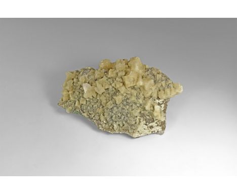 An unusually fine specimen of the zeolite mineral chabazite on quartz, from India, a few of the chabazites as hopper crystals