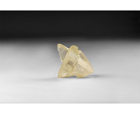 A fine specimen of two joined quartz crystals with 'rainbow' reflections, in white card tray with label reading: 'QUARTZ, Min