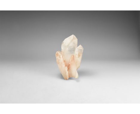 A very fine formation of several semi-translucent quartz crystals with slight shades of pinky-orange. 806 grams, 14cm (5 1/2"