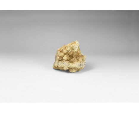 A fine specimen of pale yellow fluorite cubes on a matrix, in old white card tray. 381 grams, 88mm (3 1/2"). From the histori