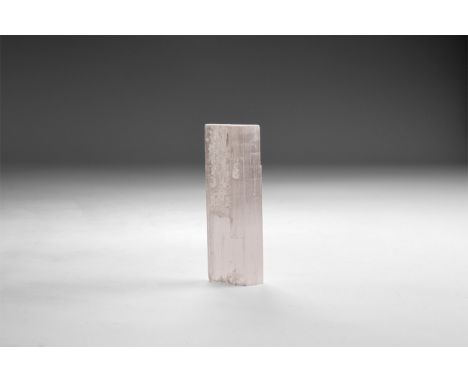 A fine gypsum column in white card tray with label reading: 'GYPSUM, var. 'satin spar', Morocco'. 16 grams, 50mm (2"). From t