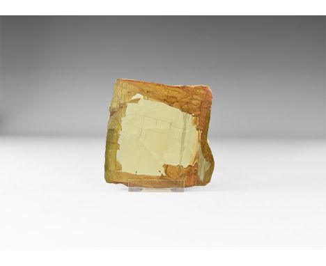 A sheet of paesina with the layers picked out in iron oxide minerals displaying the characteristic naturally occuring 'landsc