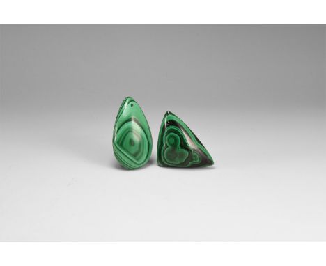 A group of polished green banded malachite pendants, one tear-shaped and once triangular. 52 grams total, 50mm (2"). From the
