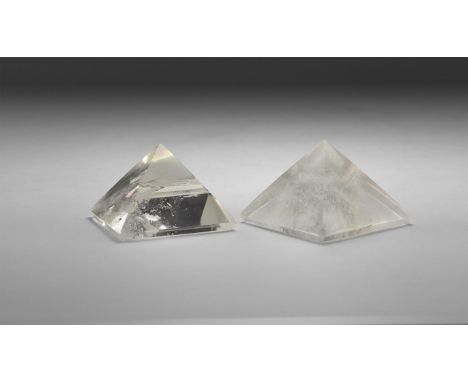 A group of two finely cut and polished pyramids of rock crystal. 104 grams total, 41-42mm (1 1/2"). From the historic ‘Victor
