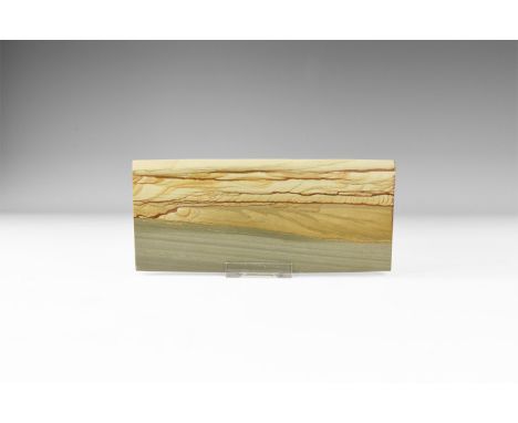 A fine picture sandstone sheet with the layers picked out in iron oxide minerals displaying the characteristic naturally occu