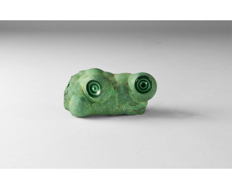 A fine malachite specimen with two cuts in two bulbs showing bands of pale and dark green colour. 184 grams, 83mm (3 1/4"). F