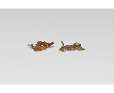 A group of two specimen of natural vein gold, mounted in a plastic display case. 8 grams total, gold 0.11 grams, 5.9-7.1mm (1