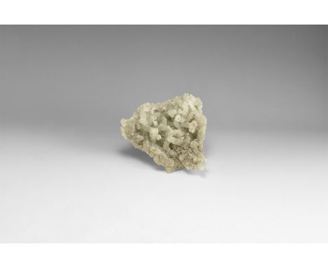 A fine specimen of a zeolite mineral exhibiting numerous columnar accretions of crystals. 270 grams, 97mm (4"). From the hist