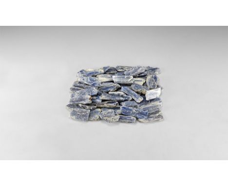 A group of fifty pale blue and white kyanite specimens, from Brazil. 1.34 kg total, 43-75mm (1 3/4 - 3"). From the historic ‘