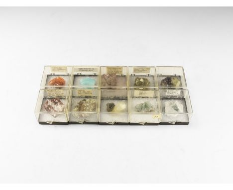 A group of ten mineral specimens in plastic boxes with old labels comprising of barite, dolomite with hemimorphite, chalcopyr