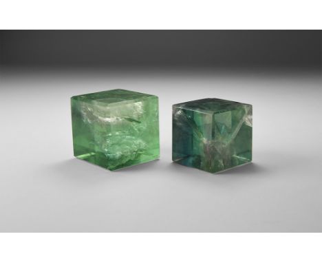 Two finely cut and polished green fluorite cubes. 194 grams total, 34-38mm (1 1/2"). From the historic ‘Victorian Museum’ and