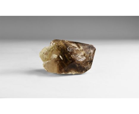 A fine crystal of a dark brown smoke quartz with accessory muscovite, in white card tray. 145 grams, 64mm (2 1/2"). From the 