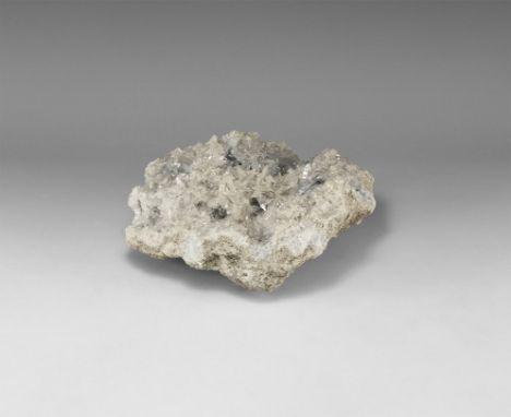 A large slab of pale blue celestite (?) crystals on a matrix. 1.85 kg, 18cm (7"). From the historic ‘Victorian Museum’ and la