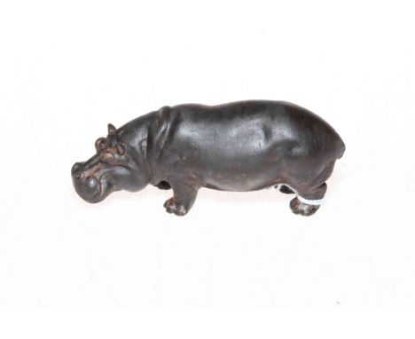 A well detailed early 20th Century cold painted bronze hippopotamus standing four square with lowered head, probably Austrian