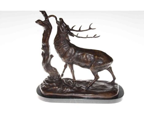 Large bronze stag on marble base, 42cm by 45cm.
