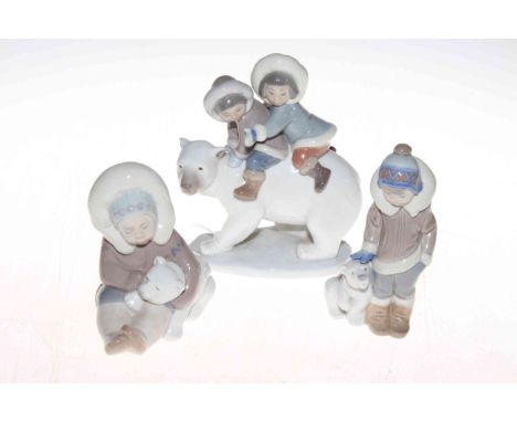 Three Lladro Polar Bear figures, 17cm to 13cm.