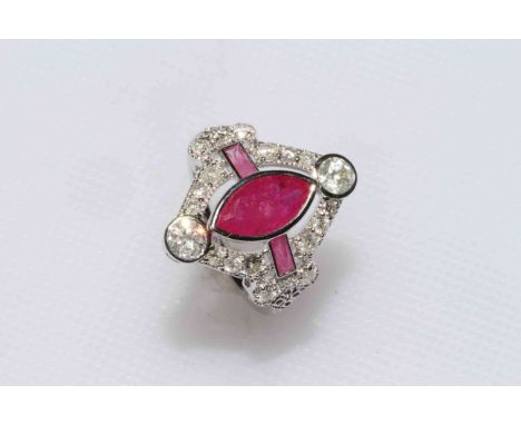 18 carat white gold ruby and diamond ring featuring one marquise cut ruby, approximate 1.00 carat and with two round brillian