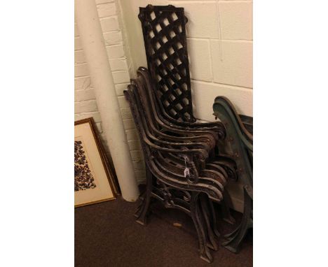 Three pairs of cast garden bench ends and cast seat.