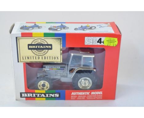 Boxed Britain's 1893-1993 centenary limited edition 1/32 Ford 100 Tractor with instruction sheet (item 5892) 