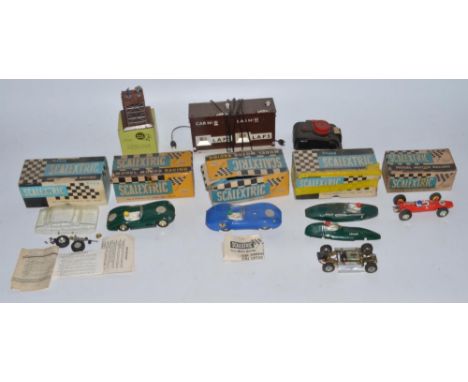 Vintage Tri-ang Scalextric vehicles and lap counter, Subbuteo table soccer TV tower, including Jaguar, Aston Martin, two C55 