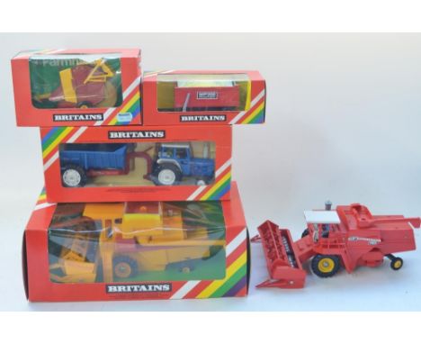 Four boxed Britain's farm models, New Holland Combine Harvester-please note 2 stickers applied upside down, see photos (9575)