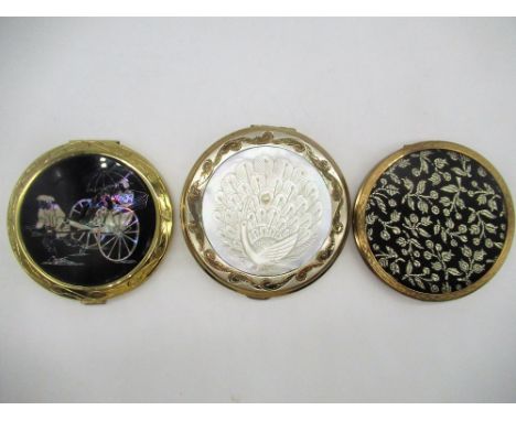 Circular compact with oriental scene, circular compact with peacock carved into mother of Pearl, Stratton circular compact wi