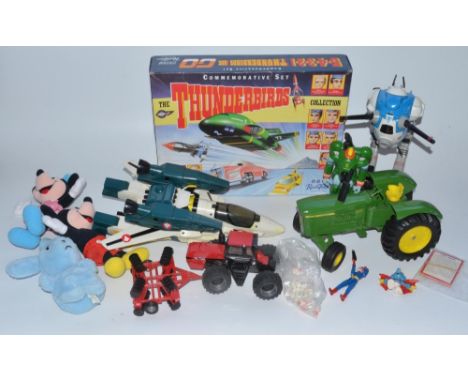 Collection of toys including a BBC Thunderbirds commemorative set, a large die-cast Ertl tractor model, a collection of Natur