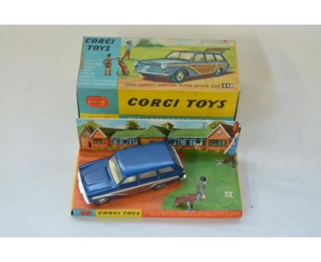 Vintage boxed Corgi Toys Ford Consul Cortina Super Estate Car (item 440) with diorama insert, figures and golf trolley 