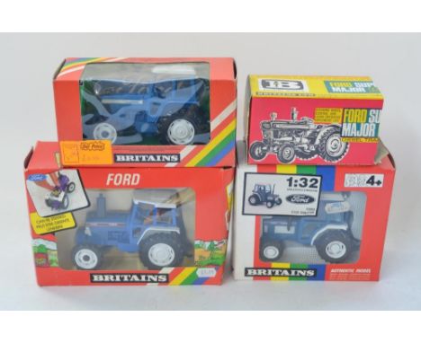 Four 1/32 Ford tractor models by Britain's: Ford 5610 (item 9527), TW20 Tractor (item 9523), 2120 Tractor (item 9495) and ano