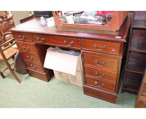 Reproduction Pedestal desk with inset Leather top and metal drop handles 