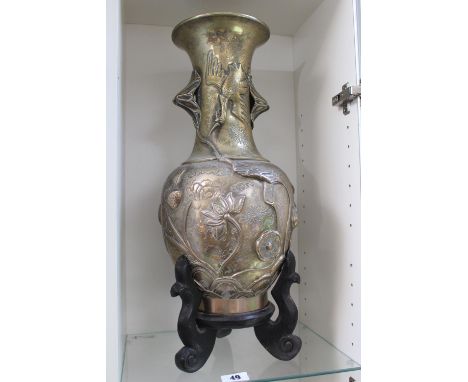 Large Chinese Brass Stork and Waterlily decorated vase 45cm on wooden scroll supported base 