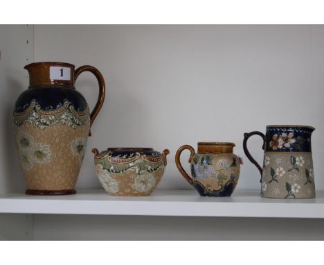 Collection of Doulton Floral incised decorated Ewer, Sucrier and Cream jug and a similar floral decorated jug 