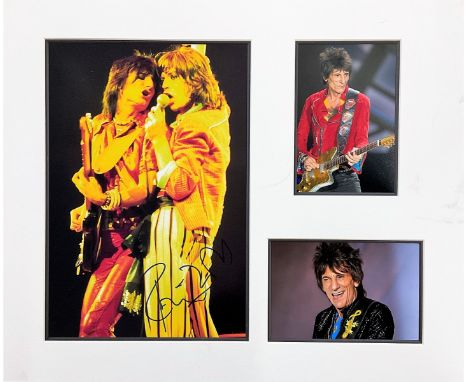 Ronnie Wood signed 18x15 mounted Rolling Stones colour photo and two unsigned photos. Ronald David Wood (born 1 June 1947) is