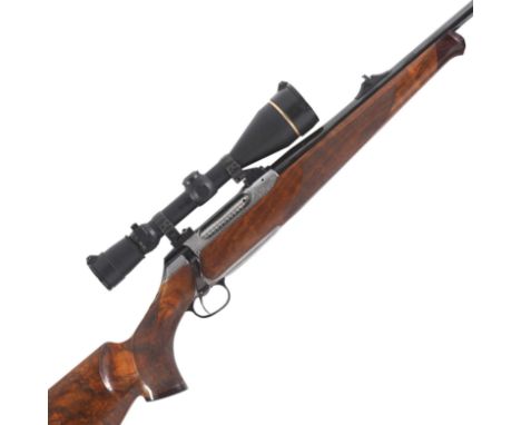 A custom-engraved .243 (Win.) 'Model 202' bolt-magazine rifle by Sauer, no. N15535The left side of the receiver engraved with