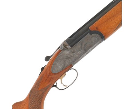 A 20-bore side-plated single-trigger over-and-under ejector gun by Rizzini, no. 45593Hold-open toplever, the action-body (top