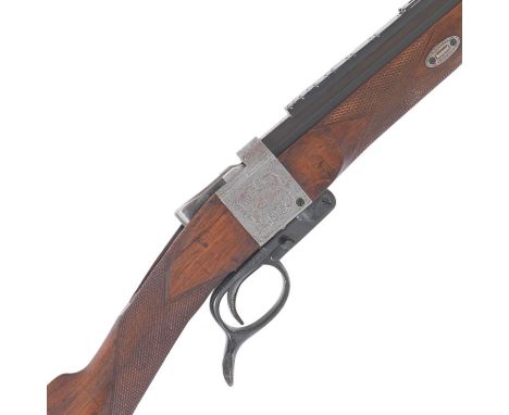 A .500/450 (No.2 Musket) falling-block rifle by Westley Richards & Co., no. 672The action-body with bold foliate-scroll engra