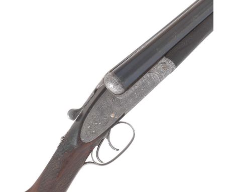 A 12-bore 'Royal' sidelock ejector gun by Holland & Holland, no. 16729The action-body with best bold foliate-scroll engraving