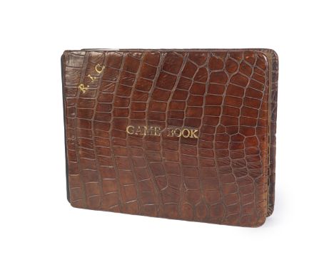 A crocodile leather-covered game book primarily concerned with shooting in India between 1940 to 1946Gilt initialled 'R.J.C.'