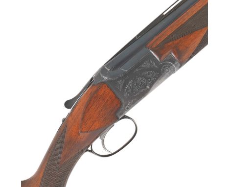 A 12-bore single-trigger over-and-under ejector gun by Browning, no. 21590Fully-selective single-trigger with manual safety-s